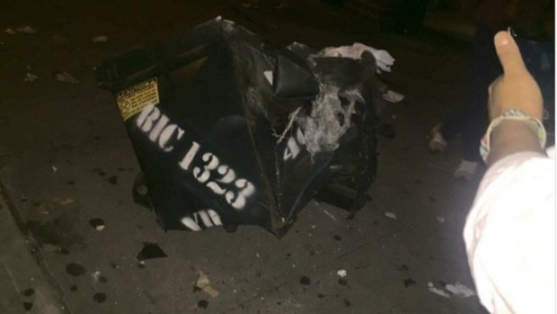 Image of the dumpster damaged in the blast. 