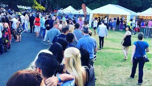 People wait in line at the NYE Above the Harbour. 