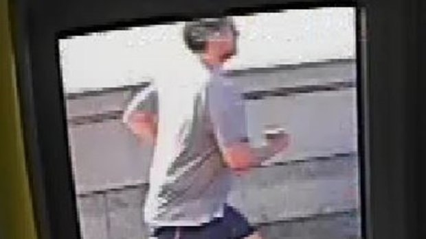 A man sought by police after a woman was shoved to the ground in London.