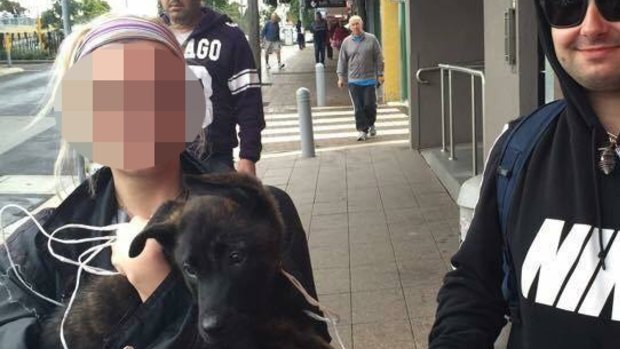 The two people who spent time with the police dog, Mr Green. The young woman has apologised for her idiotic actions. 