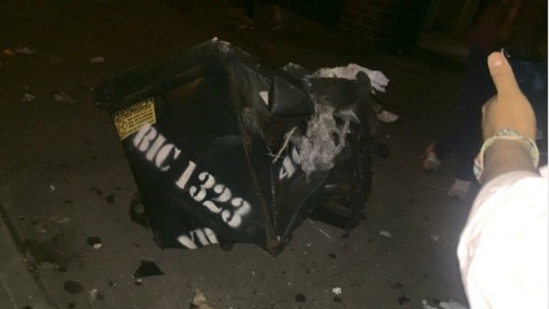 Image of the dumpster damaged in the blast. 