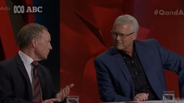 Q&A host Tony Jones, without tie, directs questions at General Australian of the Year David Morrison.