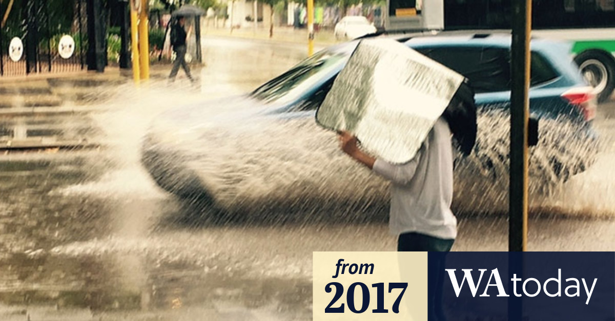 Howling winds and buckets of rain dumped in Perth spring storm
