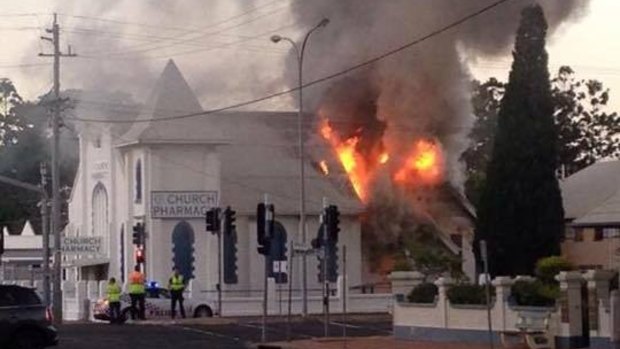 Smoke pours out of Church Pharmacy in Bundaberg.