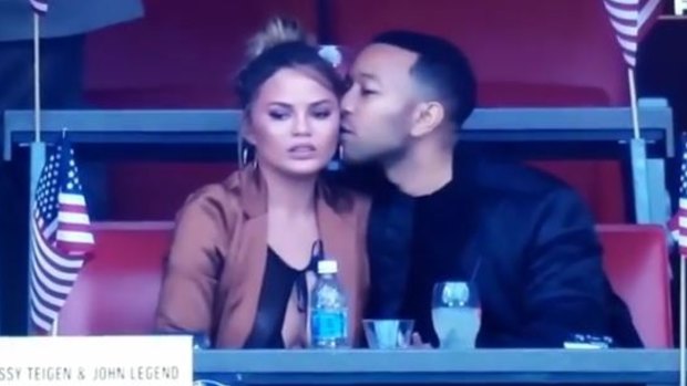 Chrissy Teigen and John Legend are having a ball at the Super Bowl.