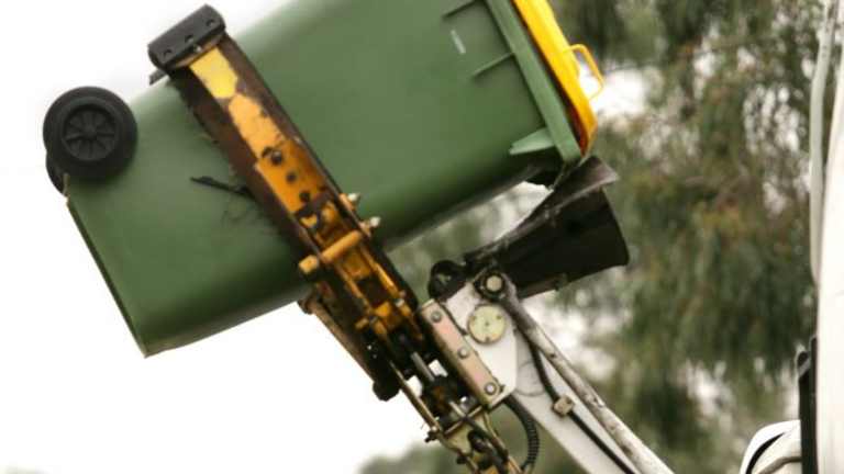 Council settles three years of trash talk over who will pick up