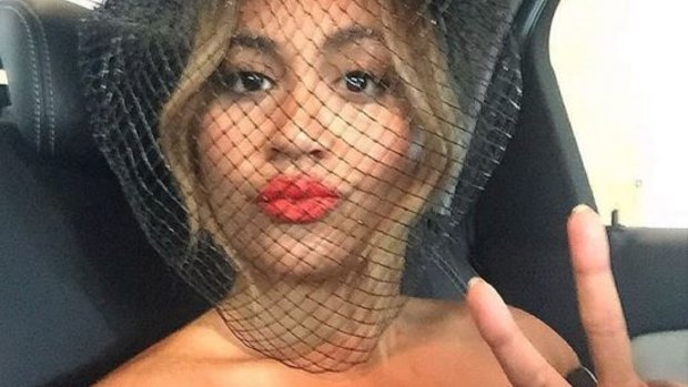 Jessica Mauboy appeared happy en route to Tuesday's Melbourne Cup