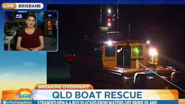 Two men and a 14-year-old boy clung to their overturned boat for three hours before being rescued.