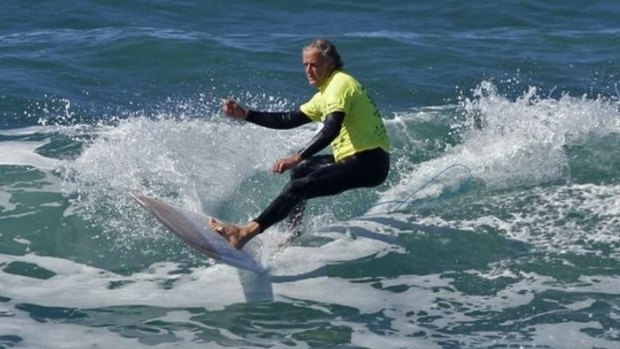 Ron Schneider surfing in the over-50 section of the Australian Surf Festival at Port Macquarie in 2012.