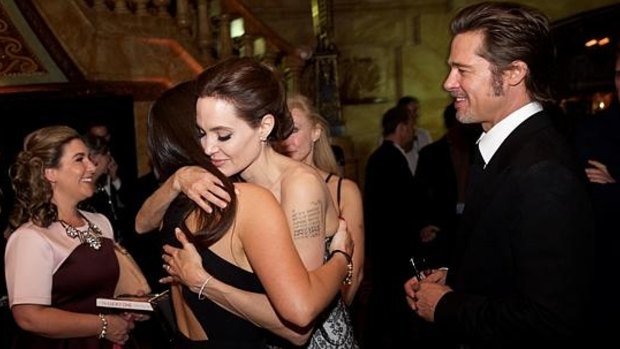 Krystal Barter, Angelina Jolie and Brad Pitt at the Unbroken premiere in Sydney.