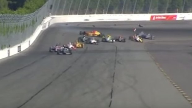 Wilson's car on the far right, and the piece of debris in the air the moment after impact.