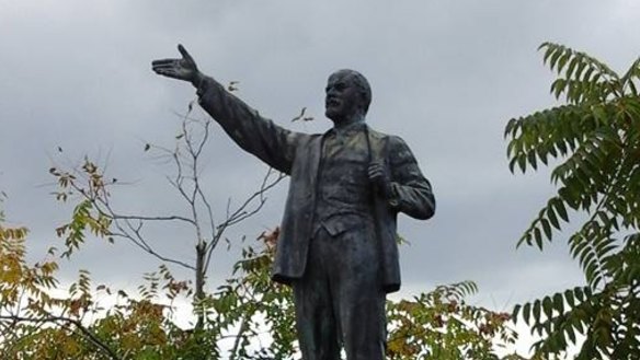 Lenin "hailing a taxi" at Memento Park, Budapest.
