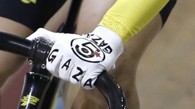The word Gaza is seen on Azizulhasni Awang's glove during the men's sprint.
