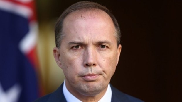 David Sprigg wants minister Peter Dutton to appear in court.