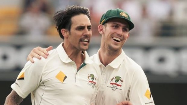 Leadership material: Mitchell Johnson celebrates with Mitchell Marsh in Brisbane.