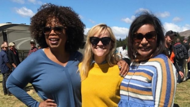 Oprah, Reese Witherspoon and Mindy Kaling in New Zealand on the set of A Wrinkle in Time. Oprah said that cast had no idea till Kaling revealed to them her news.