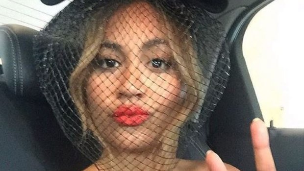 Jessica Mauboy appeared happy en route to Tuesday's Melbourne Cup