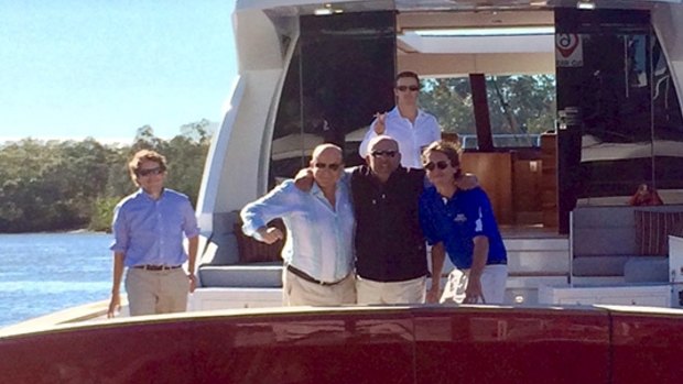 Former NewSat chief executive Adrian Ballintine (second from left) enjoying a ride on Cresta's brand new motor yacht.