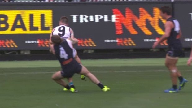 Talking point: Carlton's Bryce Gibbs was banned for this tackle on Port Adelaide's Robbie Gray.