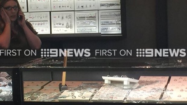 The smashed display cases at a jeweller in South Morang.