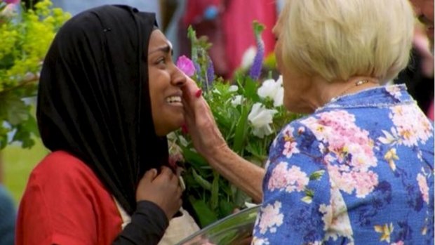 Nadiya Hussain, breaks down after bring crowned the winner of <i>The Great British Bake Off</i>, as judge Mary Berry wipes away a tear.
