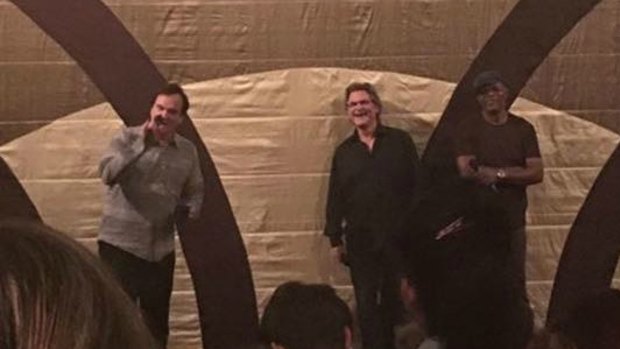 Quentin Tarantino on stage in Yarraville with Kurt Russell and Samuel L. Jackson.