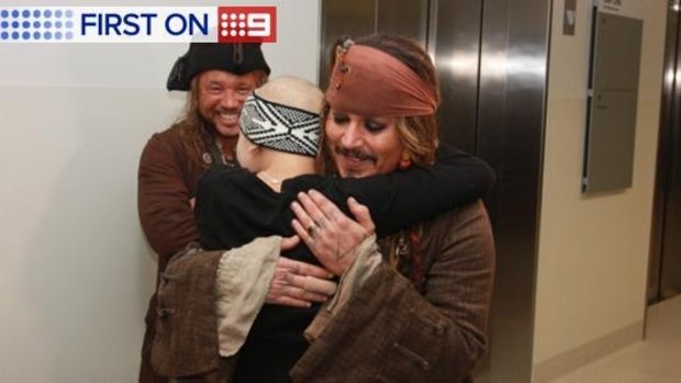 Johnny Depp visits sick kids at the Lady Cilento Children's Hospital while filming the latest Pirates of the Caribbean on the Gold Coast earlier this year.