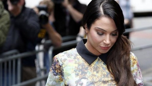 SInger Tulisa Contostavlos outside court in London after the case against her for cocaine supply collapsed.
