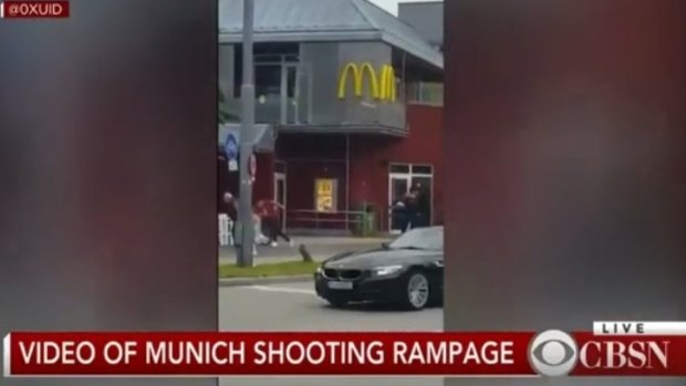 Mobile footage of a gunman outside a Munich McDonalds.