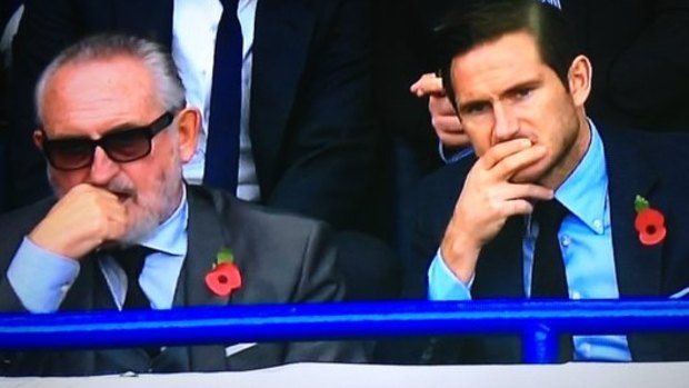 Frank Lampard senior and Frank Lampard look concerned at Stamford Bridge.