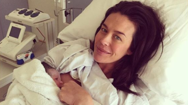 Megan Gale and her newborn daughter.