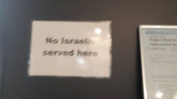 This sign was allegedly on display at the Cairns piercing shop.