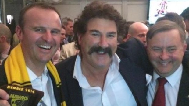 Andrew Barr, a self-described Hawthorn tragic. He tweeted this picture after the 2014 grand final, taken with Hawthorn legend Robert Dipierdomenico and Labor MP Anthony Albanese. He did not claim a taxpayer subsidy for this game.