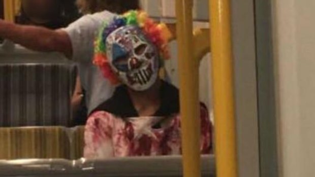 A clown photographed on public transport in Surfers Paradise on the Gold Coast.