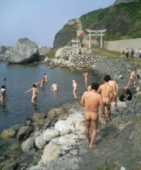 Ritual purification in Okinoshima, a sacred island in Japan.