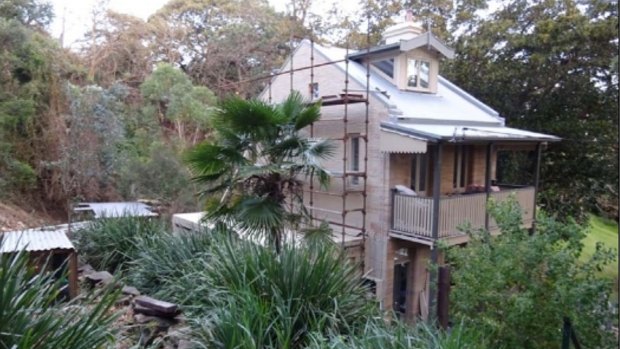 The Sheridans' Waverton cottage is surrounded by bushland.