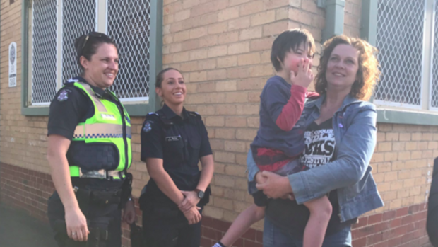 Toni Swain with Digby outside Fitzroy police station.