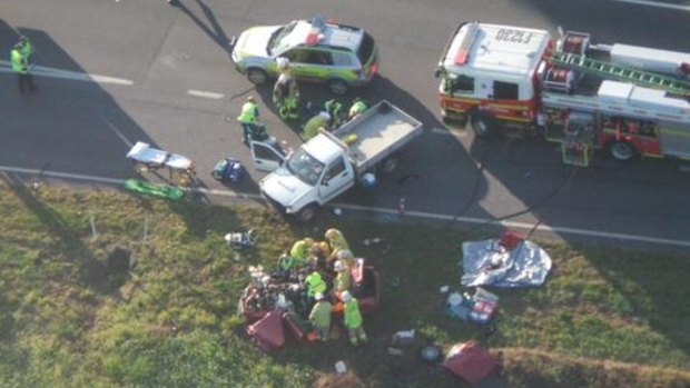 Multiple emergency services crews are at the scene of a head-on crash where three people died near Ipswich in October.