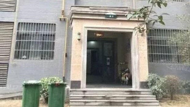Entrance of the apartment in Xi'an where a woman was found dead in a lift.
