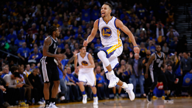 Having a ball: Steph Curry during the win over the Spurs.