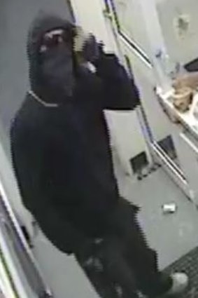 CCTV footage of the man who robbed the Spence 7 Eleven store.