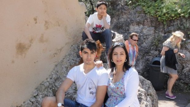 Renu Fotedar with her sons Tushar (seated) and Sahil (at back). 