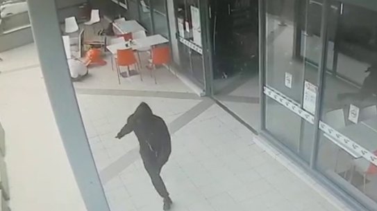CCTV shows the moment an unidentified killer fatally shot Walid "Wally" Ahmad at a Bankstown shopping centre.