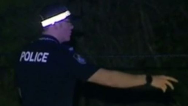 Police investigate the scene of a double stabbing in Helensvale.