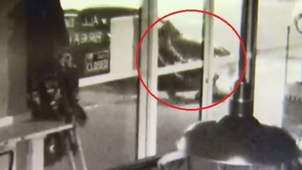 A woman was dragged by the hair as she was abducted from a petrol station on Thursday night.