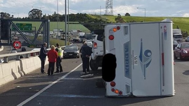 A caravan has rolled on the Western Ring Road, causing two lane closures.