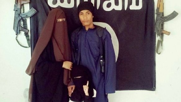 Malaysian police say  Muhammad Wanndy Mohamad Jedi (right) has been using social media to recruit Malaysians and plot terrorist attacks.