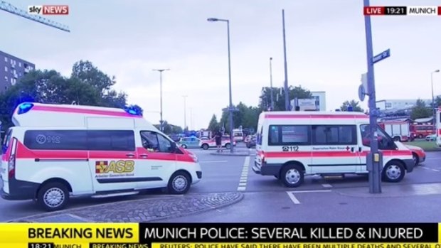 Emergency vehicles near the  shopping mall in Munich where shots have been fired.