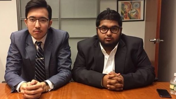 Damir Tulemaganbetov, left, with his friend Mohammed Islam in the office of public relations firm 5WPR.