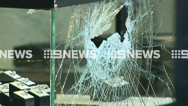 The smashed window of a Canterbury jewellery store after it was robbed on Thursday.